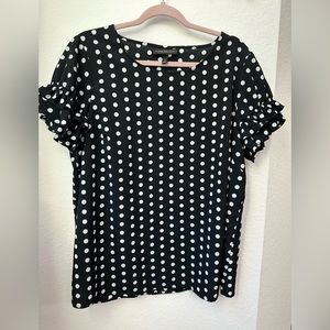 Polka dot blouse with ruffle sleeve